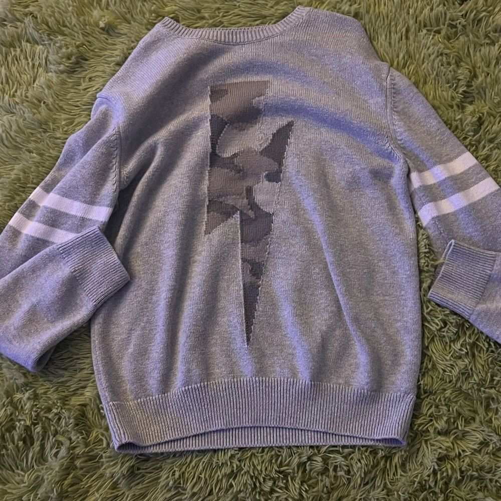 A cozy boys gray sweater